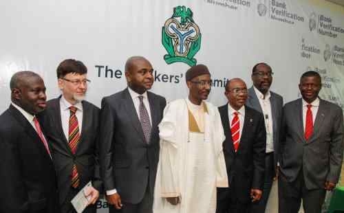 Opening ceremony of the Dermalog biometric system for Nigeria's banks - including the Governor of the Central Bank, Sanusi Lamido Sanusi (centre), and the CEO of Dermalog, Günther Mull (second from left).