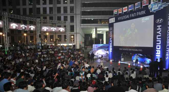 Cricket fans watching match at Hyundai Fan Park at Cyber Hub, Gurgaon