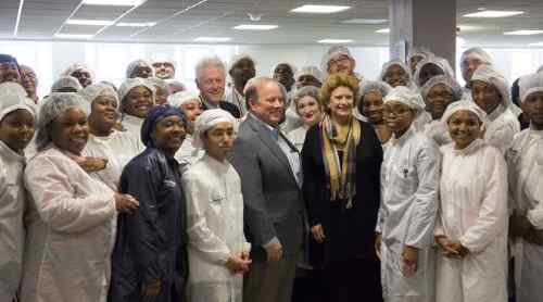 President Clinton, Detroit Mayor Mike Duggan, U.S. Senator Debbie Stabenow, Shinola Factory Workers