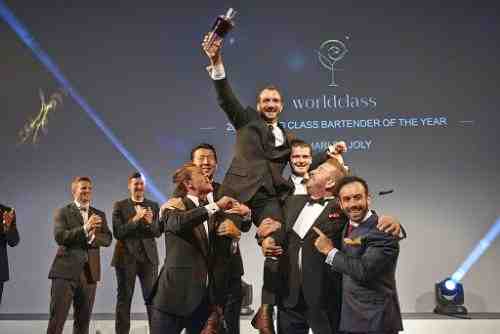 Charles Joly of the USA raised aloft by the five previous WORLD CLASS Global Winners