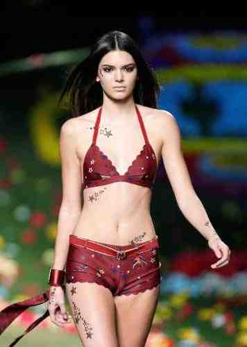 Kendall Jenner rocked Tattoo Junkee "Twin Stars" body art down the Tommy Hilfiger runway during New York Fashion Week.