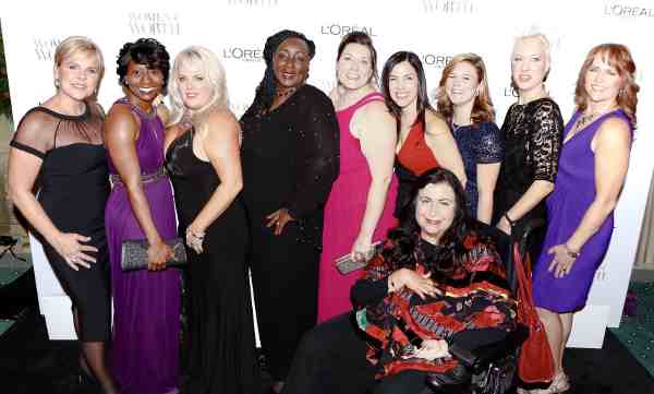 (L-R) 2014 L'Oreal Paris Women of Worth Honorees Jenny Williamson, Rachel R. Jackson-Bramwell, Stephanie Decker, Shaaron Funderburk, Corinne Cannon, Phyllis Sudman, Brittany Wenger, Audra Dipadova Wilford, Deborah Snyder (Front) Mary K. Hoodhood at Women of Worth celebration at The Pierre on December 2, 2014 in New York City.