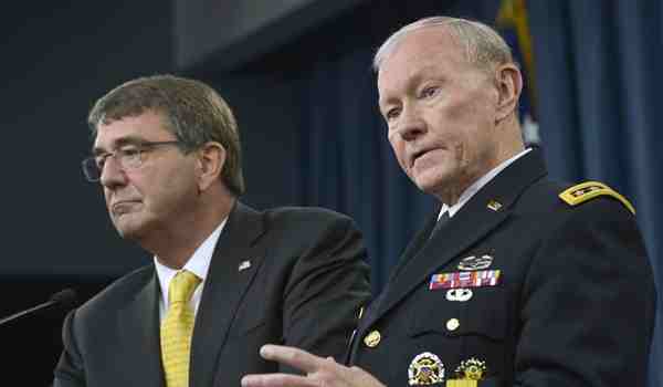Chairman of the Joint Chiefs of Staff Gen. Martin E. Dempsey answers a reporter's questions as Defense Secretary Ash Carter listens during a press conference in the Pentagon Briefing Room May 7, 2015. DoD Photo by Glenn Fawcett