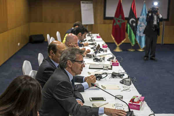 Special Representative Bernardino León (left) speaks to the media in Morocco. Photo: UNSMIL