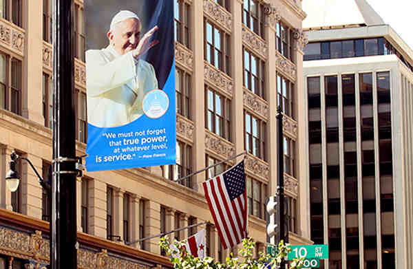 A banner in Washington, D.C. welcomes Pope Francis. The FBI is part of the highly orchestrated security effort surrounding the pope’s six-day visit to D.C., New York City, and Philadelphia.