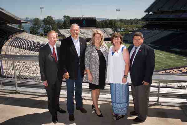 L-R: Microsoft President and Games Honorary Board Chair Brad Smith, Washington State Gov. Jay Inslee, 2018 Special Olympics USA Games CEO Beth Knox, Special Olympics athlete Stacey Johnston, Special Olympics NorthAmerica President Marc Edenzon.