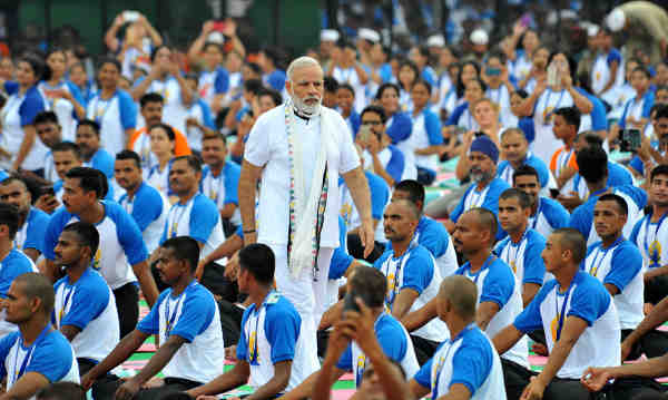 Narendra Modi with the participants during the mass yoga demonstration at the Capitol Complex, Chandigarh, on the occasion of the 2nd International Day of Yoga – 2016, on June 21, 2016