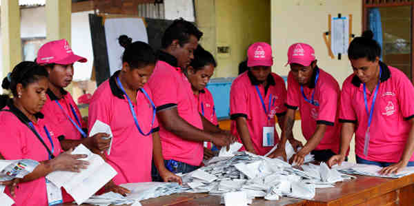 Polling officers tally votes after ballots were cast in Timor-Leste's parliamentary elections (2012). UN Photo / Martine Perret