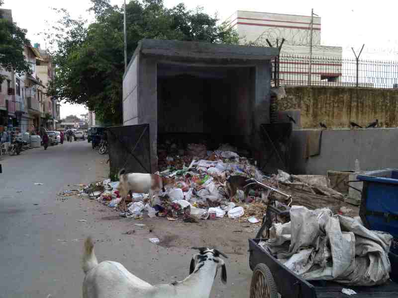 The entire waste of the locality is dumped at this site that stands right in the middle of a housing colony and near a government school. Causing disease and depression to the residents including school children. Photo: Rakesh Raman