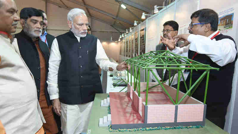 The Prime Minister, Shri Narendra Modi visiting an exhibition on the Pradhan Mantri Awas Yojana – Gramin, in Agra, Uttar Pradesh on November 20, 2016
