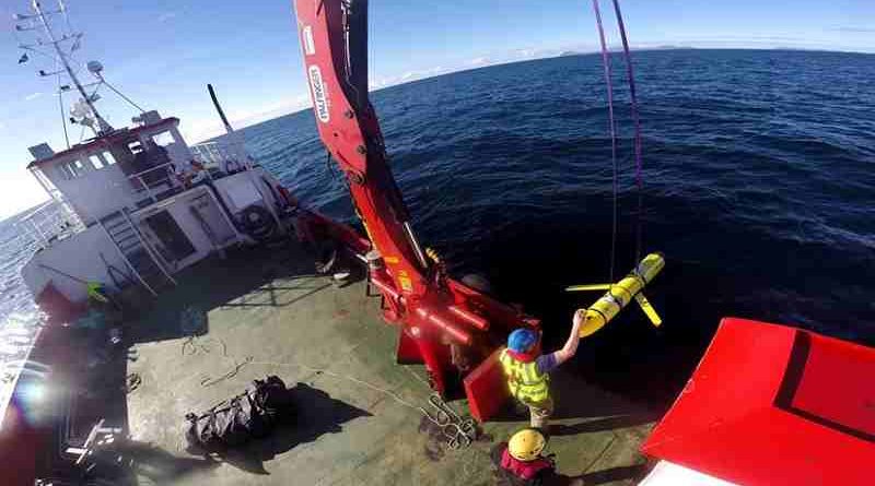 Crew members aboard the VOS Raasay recover U.S. and British Royal Navy ocean gliders taking part in the Unmanned Warrior exercise off the northwest coast of Scotland, Oct. 8, 2016. A similar unmanned underwater vehicle was seized by the Chinese Navy in international waters off the coast of the Philippines Dec. 15. Navy photo by Cmdr. Santiago Carrizosa