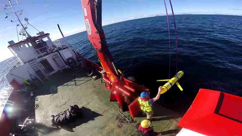 Crew members aboard the VOS Raasay recover U.S. and British Royal Navy ocean gliders taking part in the Unmanned Warrior exercise off the northwest coast of Scotland, Oct. 8, 2016. A similar unmanned underwater vehicle was seized by the Chinese Navy in international waters off the coast of the Philippines Dec. 15. Navy photo by Cmdr. Santiago Carrizosa