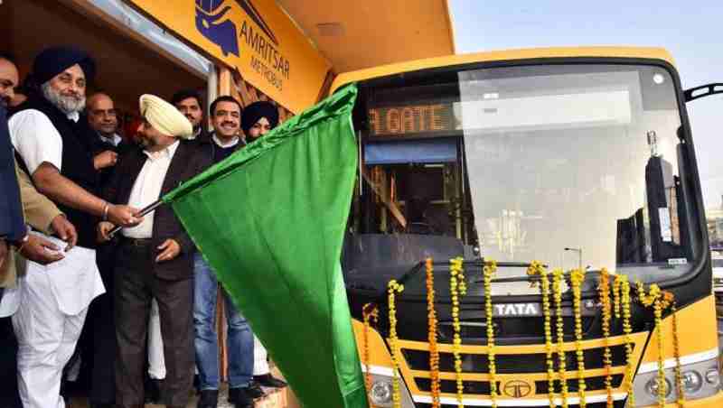 Sukhbir Singh Badal flagging off the first Metro bus in Amritsar