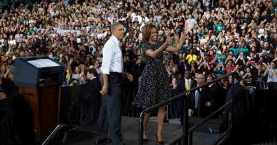 President Barack Obama and First Lady Michelle Obama acknowledge the crowd after the President spoke at Coral Reef Senior High School, Fla., March 7, 2014. (Official White House Photo by Pete Souza)