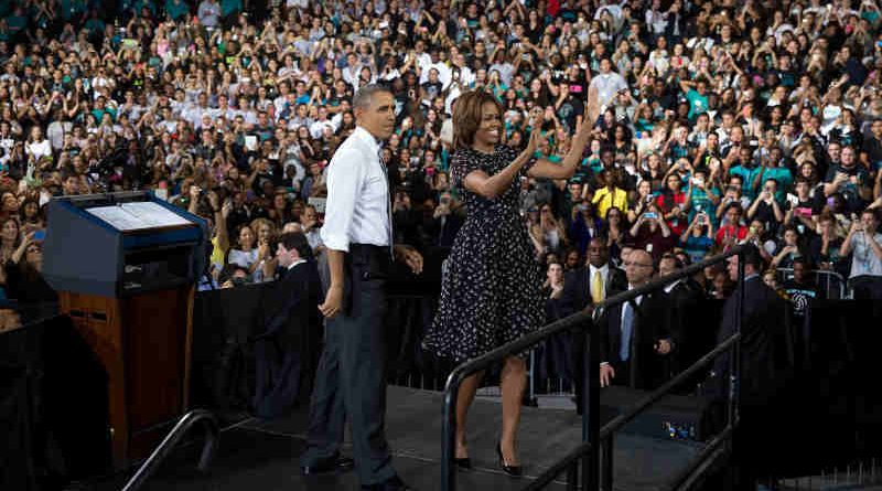 President Barack Obama and First Lady Michelle Obama acknowledge the crowd after the President spoke at Coral Reef Senior High School, Fla., March 7, 2014. (Official White House Photo by Pete Souza)