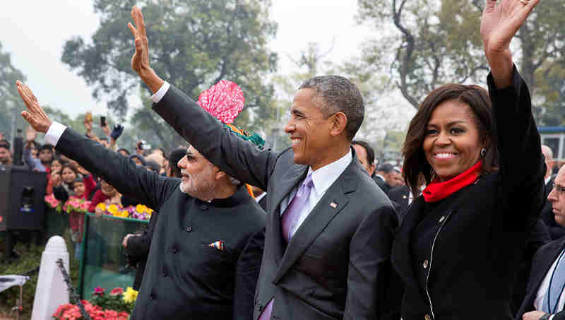 President Barack Obama and First Lady Michelle Obama wave to the crowd at the Rajpath saluting base following the Republic Day Parade in New Delhi, India, Jan. 26, 2015. (Official White House Photo by Pete Souza)