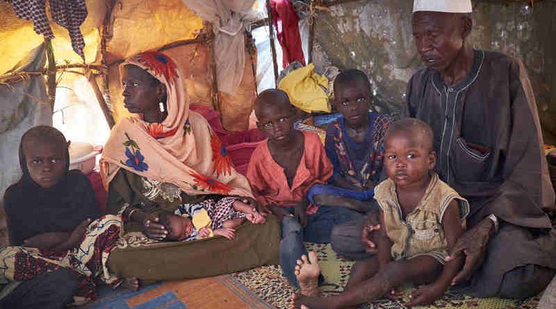 In Diffa, Niger, a family uprooted from Malam Fatouri, Nigeria, by Boko Haram shelter at a site for displaced civilians on 18 August 2016. Photo: UNICEF / Sam Phelps