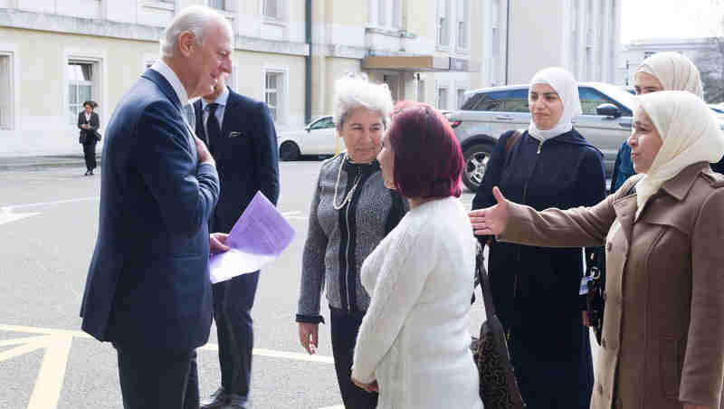 United Nations Special Envoy for Syria Staffan de Mistura welcomes a delegation of Syrian women during the Intra-Syrian talks, Geneva. 23 February 2017. UN Photo/Violaine Martin