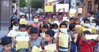 Children demonstrating in the streets of New Delhi so that the Indian government should protect them from dust pollution, noise pollution, and air pollution of extended FAR construction activity in occupied housing societies. Photo and Campaign by Rakesh Raman [ Click the photo to know the details. ]