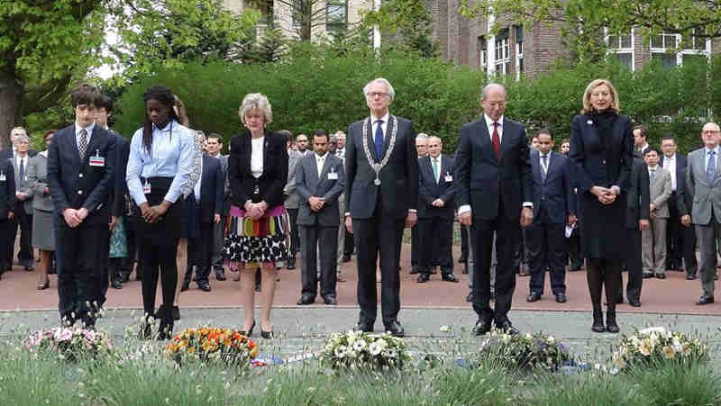 Minute of silence being observed at the annual Day of Remembrance for all Victims of Chemical Warfare held at the Headquarters of the Organisation for the Prohibition of Chemical Weapons (OPCW) in The Hague. 2015. Photo: OPCW