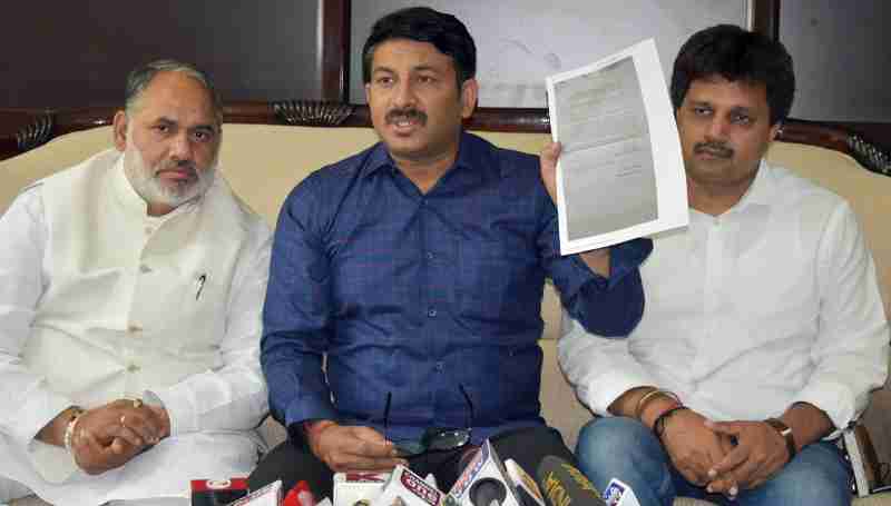 Delhi BJP President Manoj Tiwari presented copy of a complaint filed by a PWD engineer.