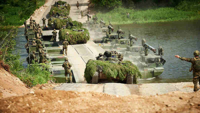 NATO Secretary General Jens Stoltenberg watched two of NATO’s battlegroups train in Lithuania.