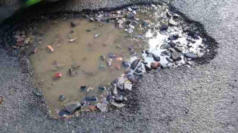 Political and bureaucratic corruption is the main cause of broken roads in Delhi. Photo: Rakesh Raman