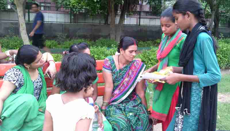 Students of RMN Foundation school explaining the benefits of modern alternative education to parents.