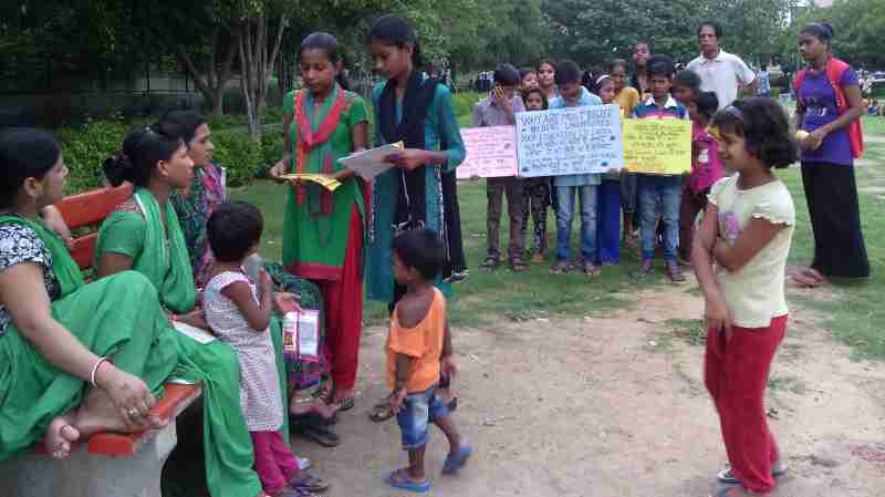 Students of RMN Foundation school explaining the benefits of modern alternative education to parents.