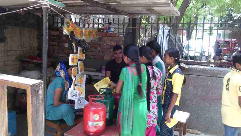 Students of RMN Foundation school explaining the benefits of modern alternative education to parents.