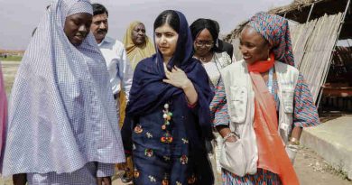 On 18 July 2017 in Maiduguri, Malala Yousafzai (center) is shown around the school in Bakassi camp by student, Fatima Grema (left) who has been displaced by the conflict in northeast Nigeria. During her visit to Nigeria, education activist Malala Yousafzai met with girls displaced by the Boko Haram crisis.