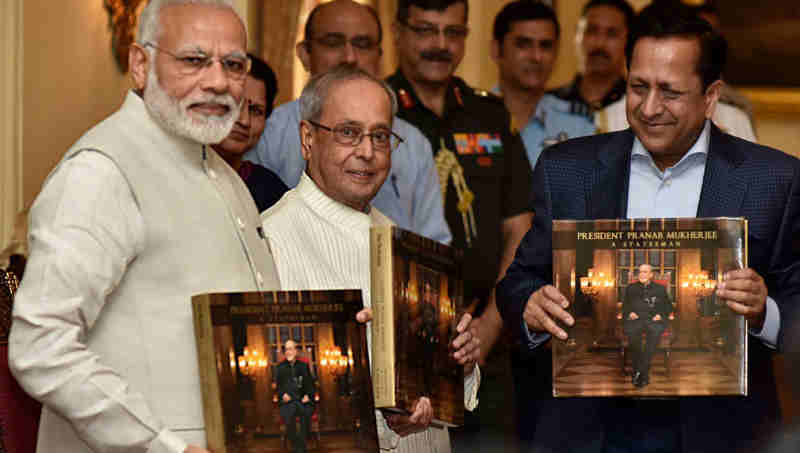 The Prime Minister, Shri Narendra Modi releasing the photo book titled “President Pranab Mukherjee - A Statesman” and presenting first copy to the President, Shri Pranab Mukherjee, at Rashtrapati Bhawan, in New Delhi on July 02, 2017.