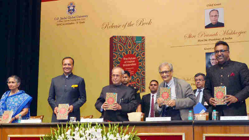 Pranab Mukherjee receiving the first copy of the book “The Future of Indian Universities: Comparative and International Perspectives”, at Rashtrapati Bhavan, in New Delhi on July 17, 2017