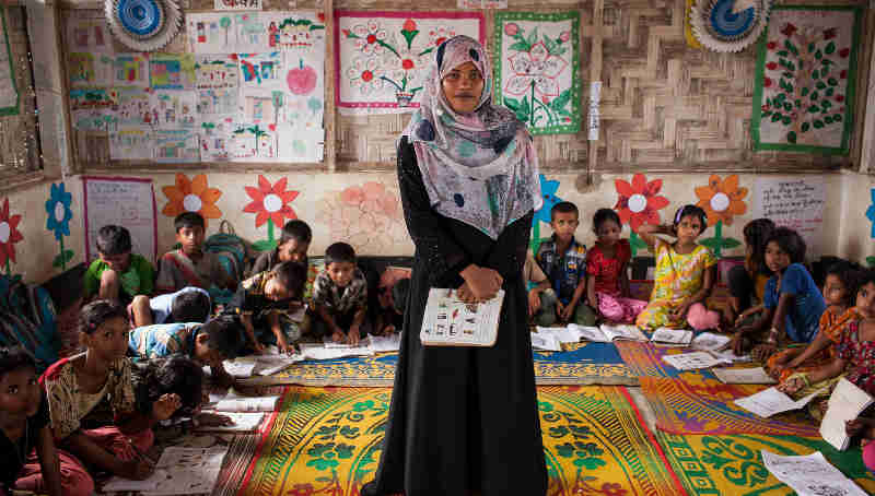 Shahera Begum 22 years old has been teaching at the Projapoti Child Learning Centre Kutupalong Makeshift Camp since Decemeber 2016. She's from the nearby town Haladia Palong Moricya, Ukhia, in Cox’s Bazar. Photo: UNICEF