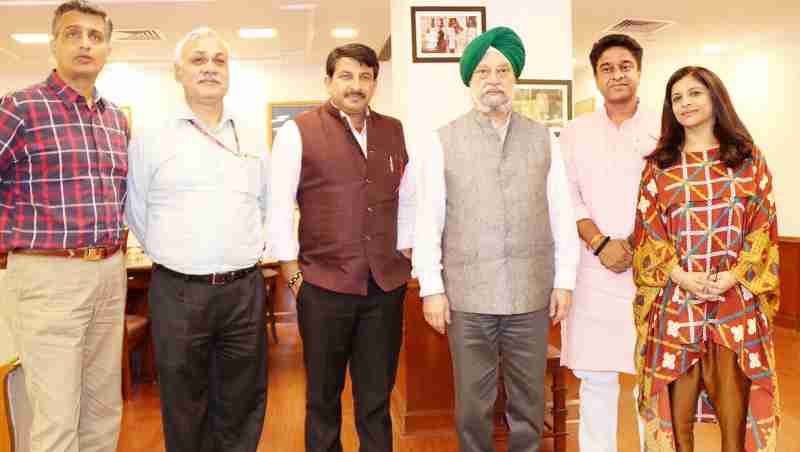 Delhi BJP President Manoj Tiwari along with a delegation of party leaders meeting the Union Urban Development Minister Hardeep Singh Puri