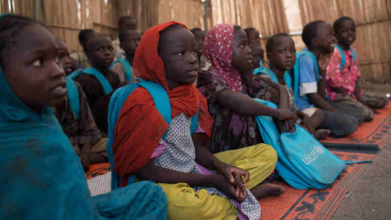 Children attend school in the town of Banki, which was recaptured by the Nigerian military in 2015 from Boko Haram, in Banki, Nigeria, 28 September 2017. Photo: UNICEF