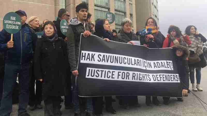 Delegation of human rights defenders outside court where trial of Taner continues. Photo: Amnesty International