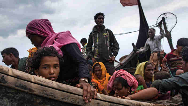 Newly arrived Rohingya refugees travel by boat from Myanmar on the Bay of Bengal to Teknaf in Cox’s Bazar district, Chittagong Division in Bangladesh. Credit: UNICEF/Patrick Brown