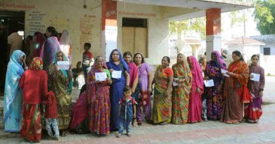 Voters waiting at a polling booth in India. Photo: PIB (Representational Image)