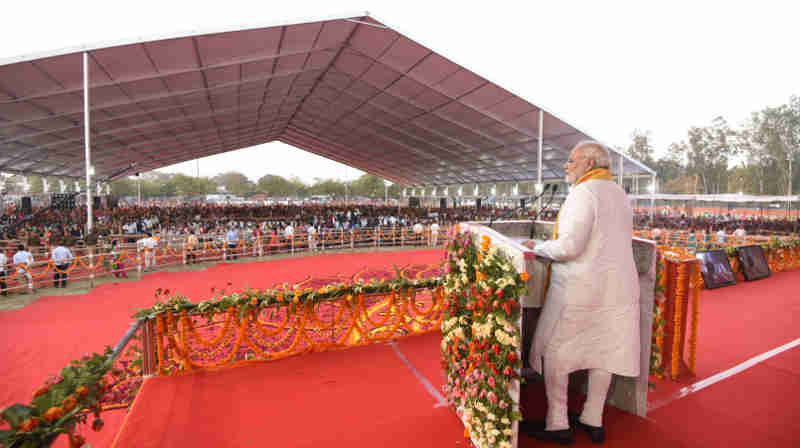 Narendra Modi addressing a public meeting, in Varanasi, Uttar Pradesh on March 12, 2018