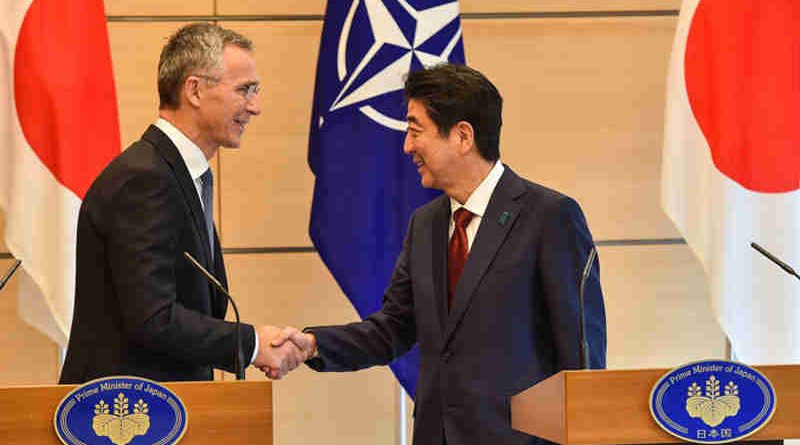NATO Secretary General Jens Stoltenberg shakes hands with Japanese Prime Minister Shinzo Abe at a joint press conference in Tokyo, 31 October 2017. Photo: NATO (file photo)