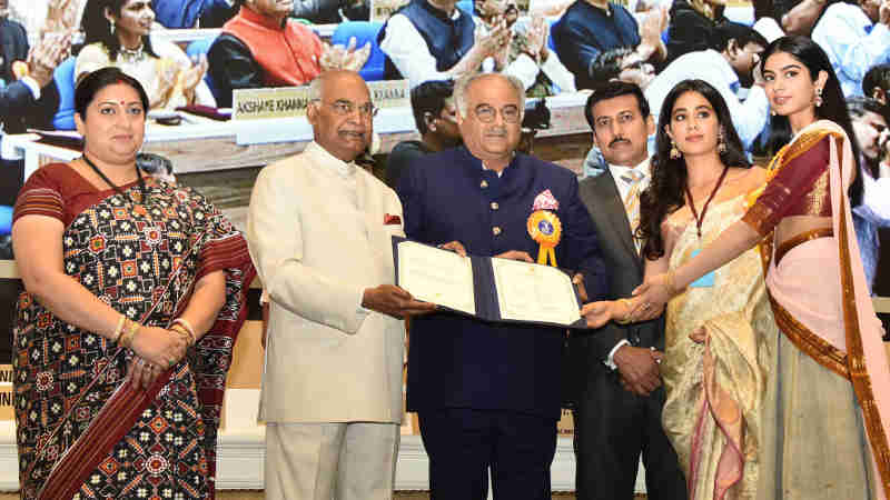 Ram Nath Kovind presenting the Best Actress Award to Sridevi (posthumous). The award was received by her husband Boney Kapoor and daughters Janhvi Kapoor and Khushi Kapoor, at the 65th National Film Awards Function, in New Delhi on May 03, 2018.