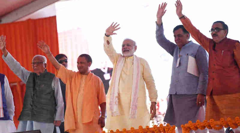 The Prime Minister, Shri Narendra Modi at the foundation stone laying ceremony of Poorvanchal Expressway, in Azamgarh, Uttar Pradesh on July 14, 2018. The Governor of Uttar Pradesh, Shri Ram Naik, the Chief Minister of Uttar Pradesh, Yogi Adityanath and other dignitaries are also seen.