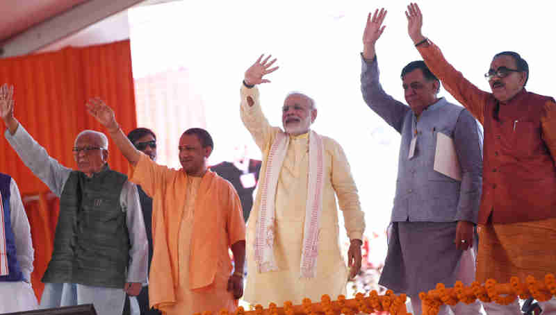 The Prime Minister, Shri Narendra Modi at the foundation stone laying ceremony of Poorvanchal Expressway, in Azamgarh, Uttar Pradesh on July 14, 2018. The Governor of Uttar Pradesh, Shri Ram Naik, the Chief Minister of Uttar Pradesh, Yogi Adityanath and other dignitaries are also seen.