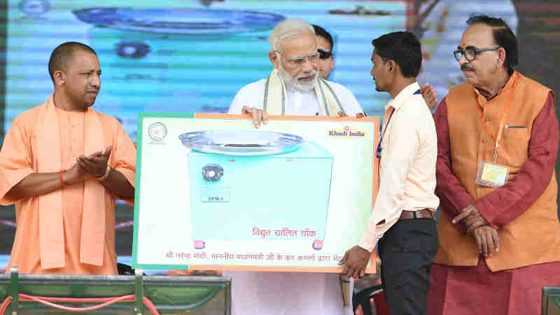 Narendra Modi at the inauguration of the various development projects, in Varanasi, Uttar Pradesh on September 18, 2018. The Chief Minister of Uttar Pradesh, Yogi Adityanath is also seen.