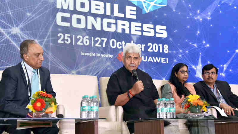 Manoj Sinha addressing the press conference on the outcomes of India Mobile Congress-2018, in New Delhi on October 27, 2018. The Secretary, (Telecom), Ms. Aruna Sundararajan and other dignitaries are also seen.