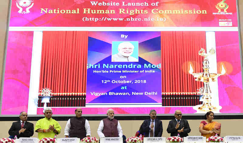 Narendra Modi launching the National Human Rights Commission Website, at the Silver Jubilee Foundation Day function of the National Human Rights Commission, in New Delhi on October 12, 2018