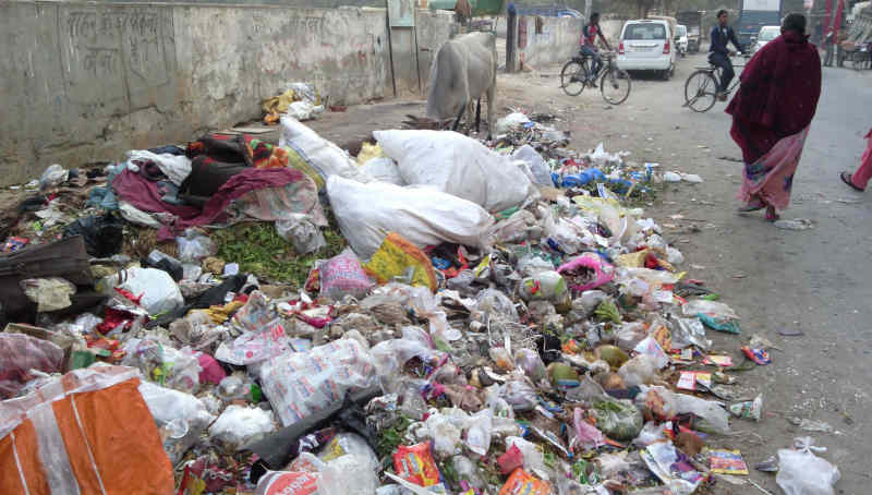 A dirty street in India's capital New Delhi. The authorities are so careless that they do not get the localities cleaned. Bureaucratic and political corruption is the main reason for dirty streets and increasing pollution which is causing diseases and deaths among the people of the city. Photo: Rakesh Raman / RMN News Service