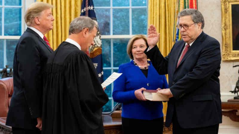 President Donald J. Trump participates in swearing-in of William P. Barr administered by U.S. Supreme Court Chief Justice John Roberts on February 14, 2019. Attorney General Barr's wife, Christine, holds the Bible. Official White House Photo by Tia Dufour