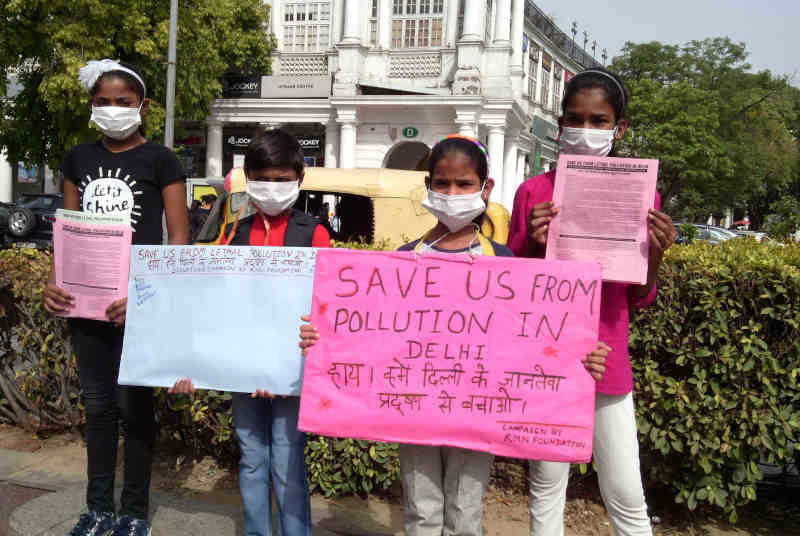 Children – who study at the RMN Foundation free school – have launched a new pollution-control campaign in Delhi. Photo: Rakesh Raman / RMN News Service